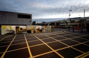 Installation of Weymouth/Portland hoardings at Weymouth Railway Station during Olympic Sailing Events 2012.